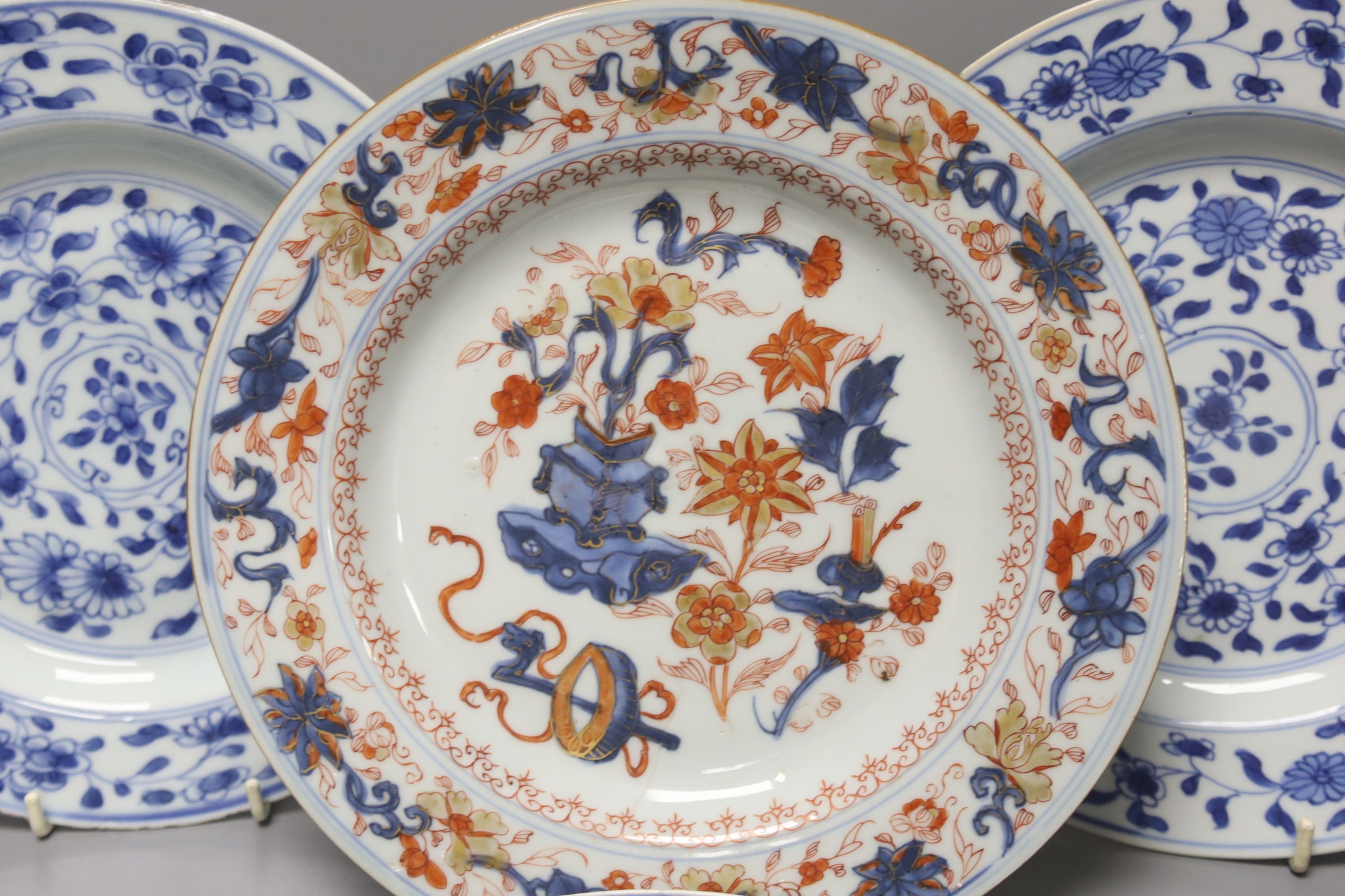 A pair of 18th century Chinese blue and white plates, together with two Chinese Imari dishes, all Kangxi period, largest 23cm